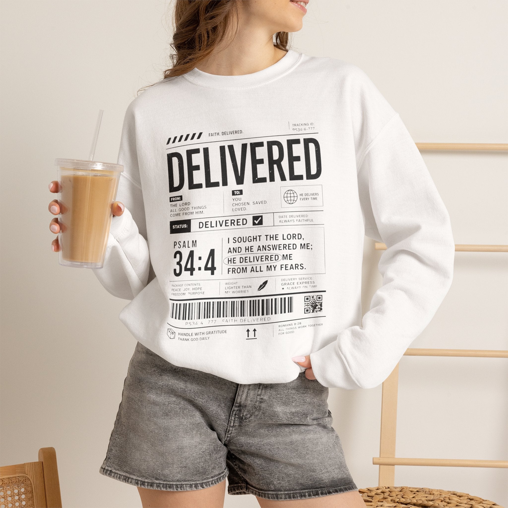 Delivered Sweatshirt — 'Delivered' Typography Crewneck with Psalm 34:4 Design