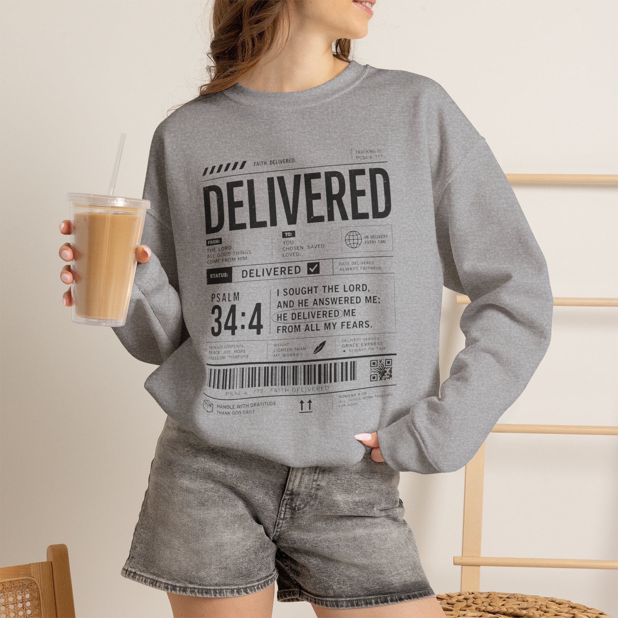 Delivered Sweatshirt — 'Delivered' Typography Crewneck with Psalm 34:4 Design